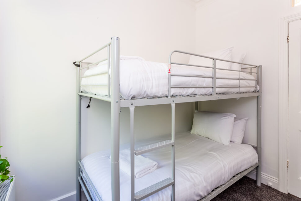 White bunk bed bedroom