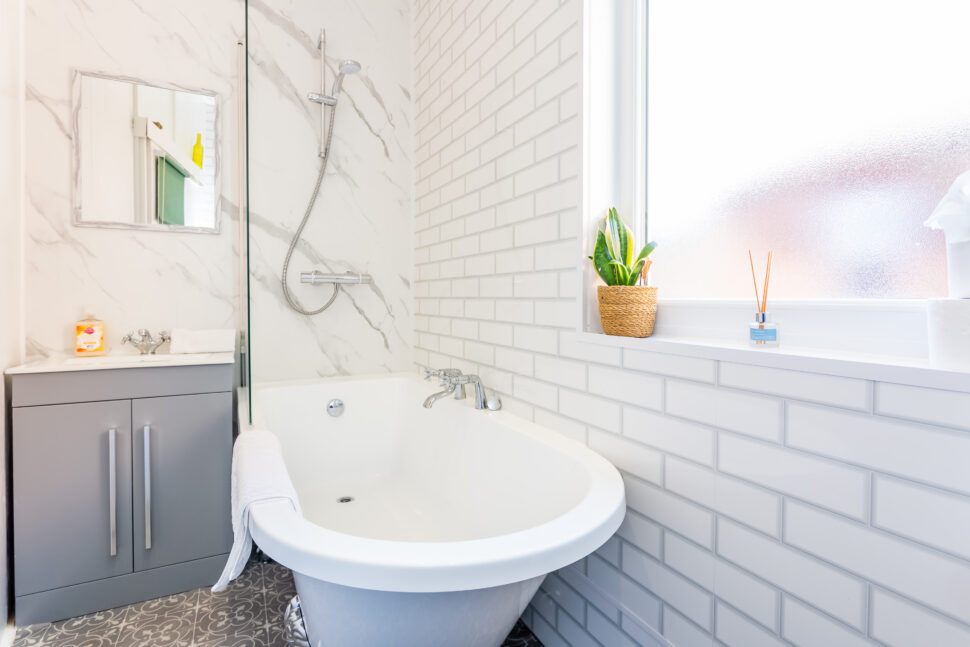 White and grey traditional shower bathroom