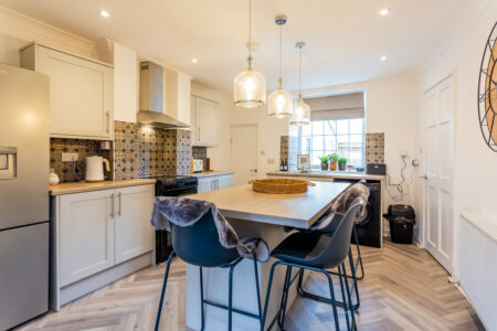 Grey shaker kitchen with island breakfast bar