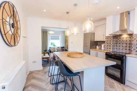 Grey shaker kitchen with island breakfast bar