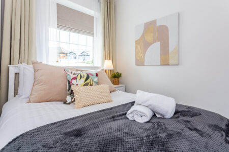 White and grey double bedroom