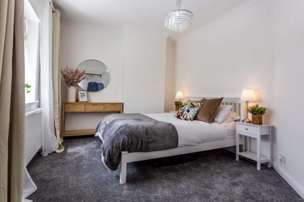 White and grey double bedroom