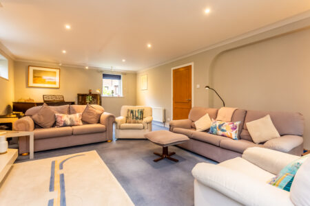 Living room with grey sofas and carpets