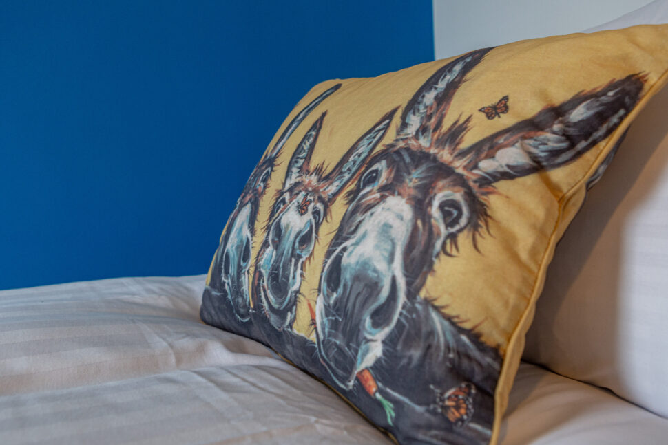 Blue single bedroom with exotic animal accessories