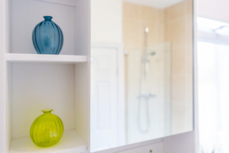 Beige tiled bathroom