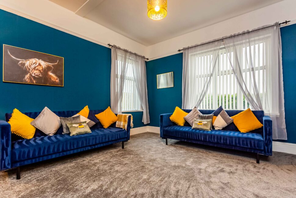 living room with blue sofas